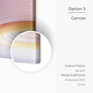 May include: Close-up of a canvas print with a gradient of pink, yellow, and white. The canvas is stretched over a wooden subframe, which is 0.79 inches thick.