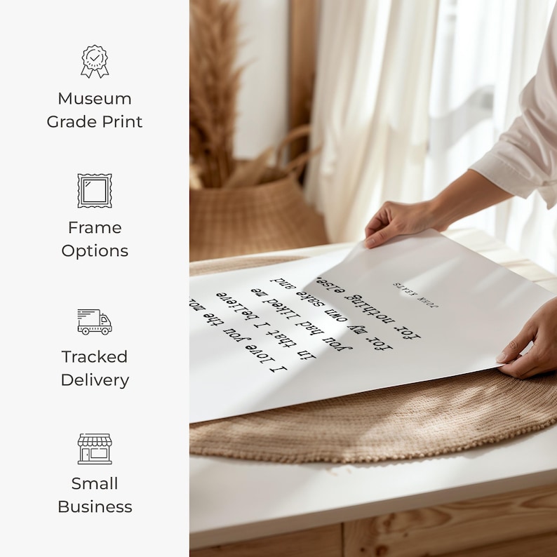 a person placing a piece of paper on top of a table