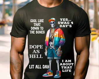 May include: Black t-shirt with a skeleton wearing a colorful jacket and holding a microphone. The text on the shirt reads "Cool like that down to the bones, dope as hell, lit all day, yes... swag 4 day's, I am about that life."