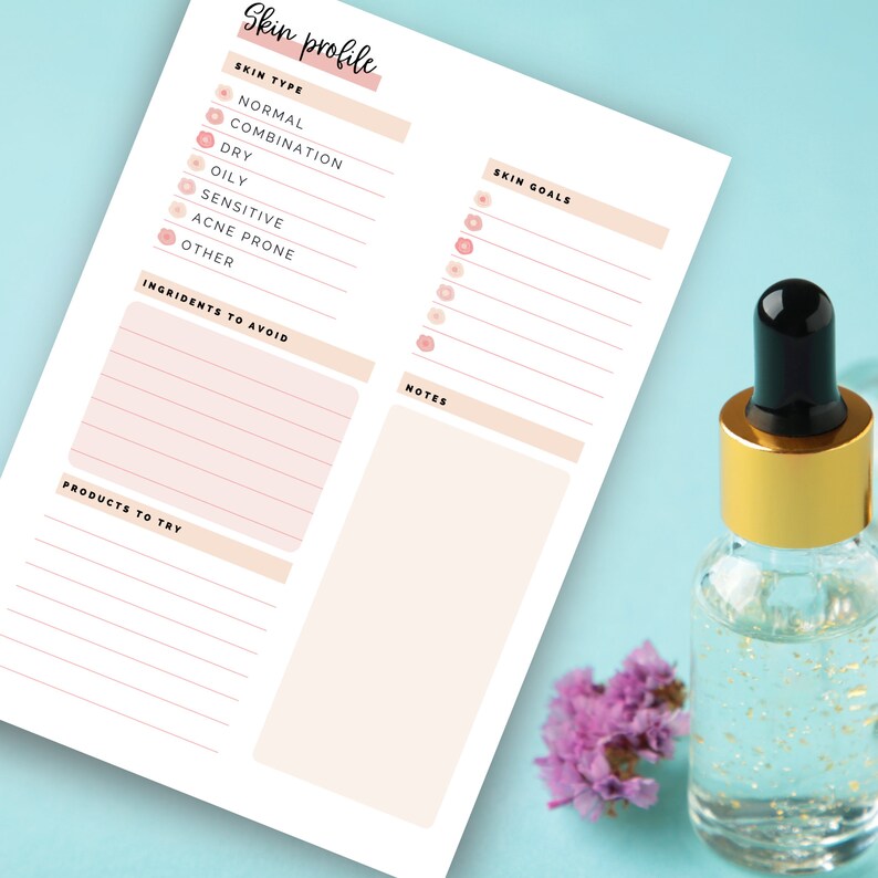 May include: A skincare profile sheet with headings for skin type, skin goals, ingredients to avoid, products to try, and notes. A clear glass bottle with a gold cap and a black dropper is next to the sheet. A small purple flower is also next to the bottle.