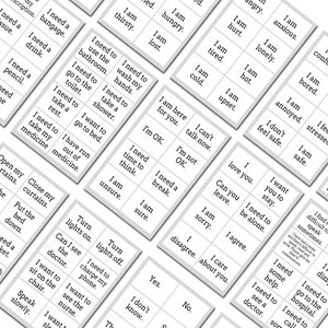 Peut inclure: Un jeu de cartes blanches avec du texte noir, chaque carte contenant une phrase diff&eacute;rente li&eacute;e aux sentiments, aux besoins et &agrave; la communication. Les phrases incluent "J'ai faim", "Je suis fatigu&eacute;", "J'ai besoin d'une pause", "Je veux rester", "J'ai besoin d'aller aux toilettes", "J'ai besoin de me reposer", "J'ai besoin de prendre mes m&eacute;dicaments", "Je suis l&agrave; pour toi", "Je vais bien", "Je ne vais pas bien", "Je t'aime", "J'ai besoin d'aide", "J'ai besoin de voir un m&eacute;decin", "J'ai besoin d'aller &agrave; l'h&ocirc;pital", "J'ai besoin d'appeler quelqu'un", "Je ne peux pas parler maintenant", "Peux-tu partir", "J'ai besoin d'&ecirc;tre seul", "Je suis d'accord", "Je ne suis pas d'accord", "Je me soucie de toi", "Je suis en col&egrave;re", "Je suis anxieux", "Je m'ennuie", "J'ai chaud", "J'ai froid", "Je suis contrari&eacute;", "Je ne me sens pas en s&eacute;curit&eacute;", "Je suis en s&eacute;curit&eacute;", "J'ai du mal &agrave; parler parfois", "Je ne suis pas s&ucirc;r", "Je suis s&ucirc;r", "Oui", "Non", "Je ne sais pas", "Allumer les lumi&egrave;res", "&Eacute;teindre les lumi&egrave;res", "Puis-je voir le m&eacute;decin", "Je veux m'asseoir sur la chaise", "Parlez lentement", "Je veux voir l'infirmi&egrave;re", "Je veux charger mon t&eacute;l&eacute;phone".