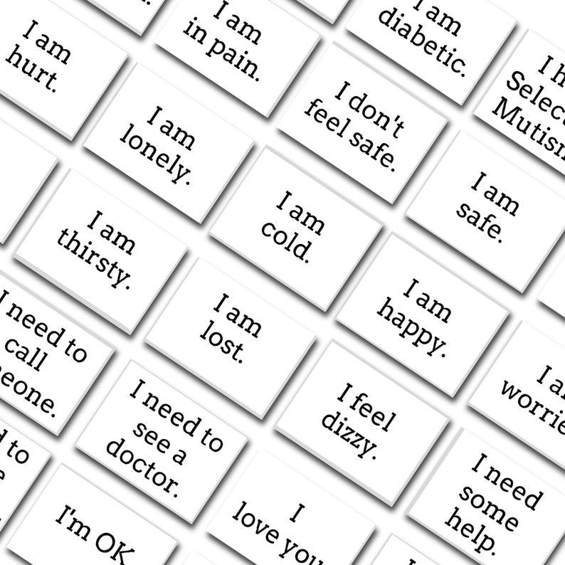 Peut inclure: Cartes blanches avec du texte noir, chaque carte a une phrase diff&eacute;rente li&eacute;e aux sentiments et aux besoins. Les phrases incluent "Je suis bless&eacute;", "Je suis seul", "J'ai soif", "J'ai besoin d'appeler quelqu'un", "J'ai mal", "Je ne me sens pas en s&eacute;curit&eacute;", "Je suis en s&eacute;curit&eacute;", "J'ai froid", "Je suis perdu", "J'ai besoin de voir un m&eacute;decin", "Je suis heureux", "Je me sens &eacute;tourdi", "Je t'aime", "Je vais bien", "J'ai besoin d'aide".