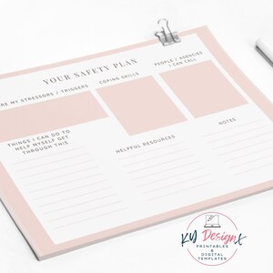 May include: A pink printable safety plan worksheet with sections for stressors, coping skills, helpful resources, people to call, and notes.