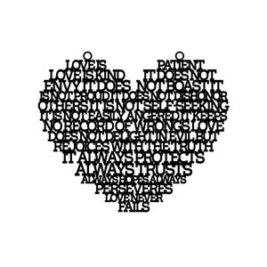 May include: A black heart-shaped wall hanging with the words "Love is Kind" and other phrases about love cut out of the material. The words are arranged to form the shape of a heart.
