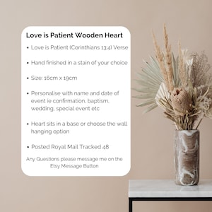 May include: A wooden heart with the text "Love is Patient" and the verse from Corinthians 13:4. The heart measures 6.3 inches by 7.5 inches and can be personalized for events like weddings or baptisms. It can sit in a base or be wall-mounted.
