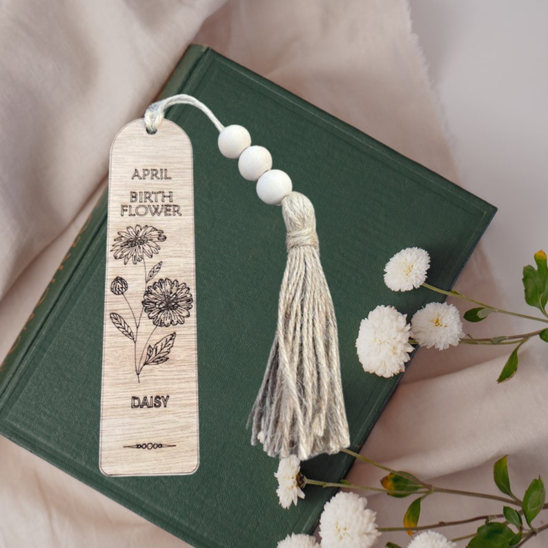 April Birth Flower Wooden Bookmark with Jute Tassels and Wooden Beads.  Engraved with the wording April Birth Flower Daisy