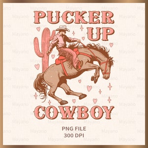 May include: A vintage-style graphic featuring a cowboy riding a bucking bronco. The image includes a cactus, hearts, and stars, with the words "Pucker Up Cowboy" in a pink, distressed font. The image is labeled "PNG FILE 300 DPI."