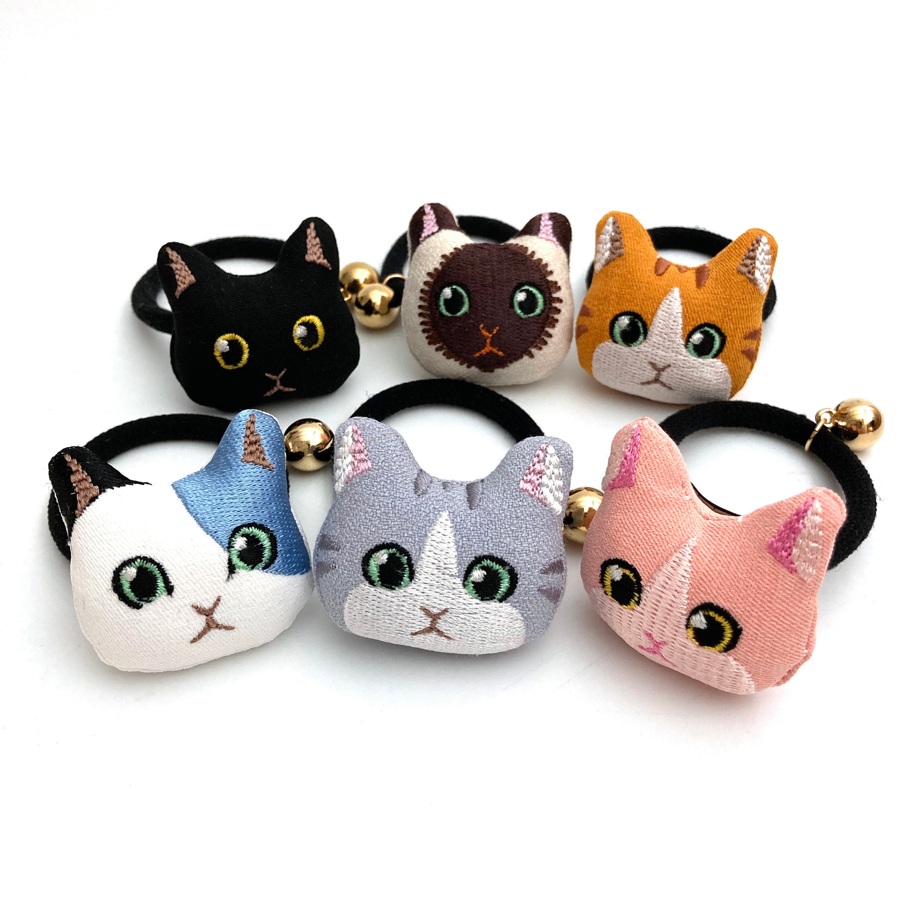 hair tie cat toy
