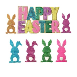 May include: A set of colourful, sparkly iron-on patches featuring the words "Happy Easter" and several bunnies. The bunnies are in various colours, including pink, blue, green, and purple.