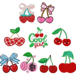 May include: A collection of embroidered cherry patches in various designs. Some cherries have bows, others have a gingham pattern, and one says "Cool girl". The patches are red, pink, green, and blue, with the brand name "Longancraft" at the top.