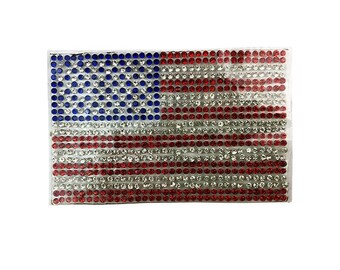 May include: A red, white and blue American flag made of rhinestones. The flag is on a white background.