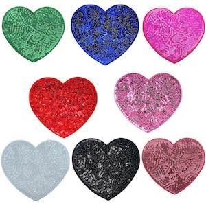 May include: Eight heart-shaped patches with a sequin design. The patches are in the colors green, blue, pink, red, light pink, silver, black, and rose.