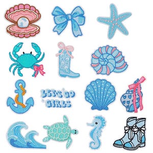May include: A collection of embroidered patches with a nautical theme. Designs include a seashell, bow, starfish, crab, cowboy boot, nautilus shell, anchor, wave, turtle, seahorse, and boots. The text "Let's Go Girls" is also included. The patches are in shades of blue, pink, and white.