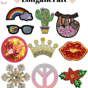 May include: A set of 12 iron-on patches featuring various designs, including a rainbow, a cactus, a sloth, sunglasses, a heart, a crown, lips, a snowflake, a peace sign, and a poinsettia. The patches are adorned with sequins and glitter.