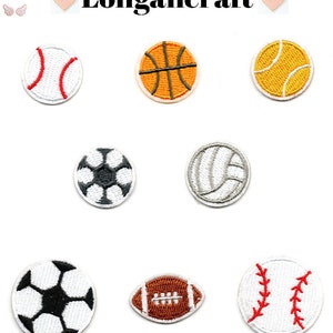 May include: Set of nine embroidered iron-on patches featuring different sports balls: baseball, basketball, tennis, soccer, volleyball, football, and a soccer ball with a star design. The patches are white with colored details.