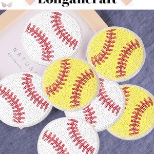 May include: Six round, white and yellow baseball-themed patches with red stitching. The patches are made of sequins and are perfect for adding a sporty touch to clothing or crafts.
