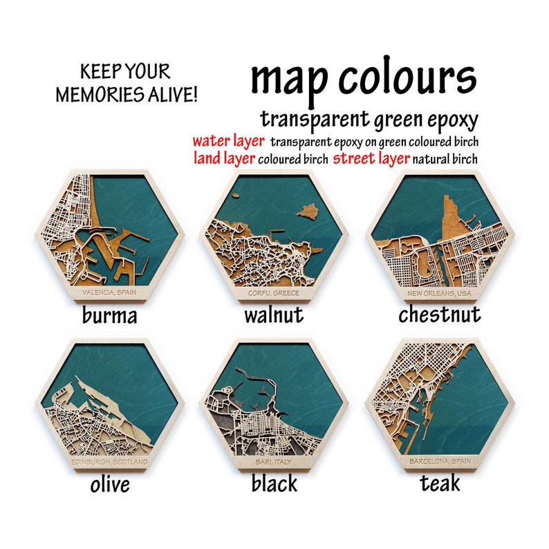 Peut inclure: Six plaques hexagonales en bois avec diff&eacute;rentes cartes de villes et options de couleurs. Les couleurs sont Burma, Noyer, Ch&acirc;taigne, Olive, Noir et Teck. Le texte "map colours" est en haut de l'image. Le texte "transparent green epoxy" est sous le texte "map colours". Le texte "water layer transparent epoxy on green coloured birch" est sous le texte "transparent green epoxy". Le texte "land layer coloured birch street layer natural birch" est sous le texte "water layer transparent epoxy on green coloured birch".