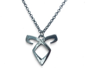 Super Hero. Supernatural Pendant Necklace. Silver Tone