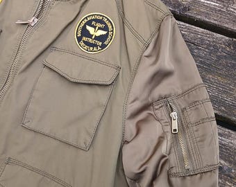 Veste militaire de Zara avec des patchs américains authentiques et