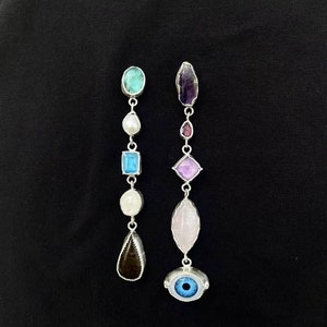 avant garde silver earrings with evil eye and mixed gemstones , bold colorful mismatched earrings,  amethyst aquamarine moonstone jewelry