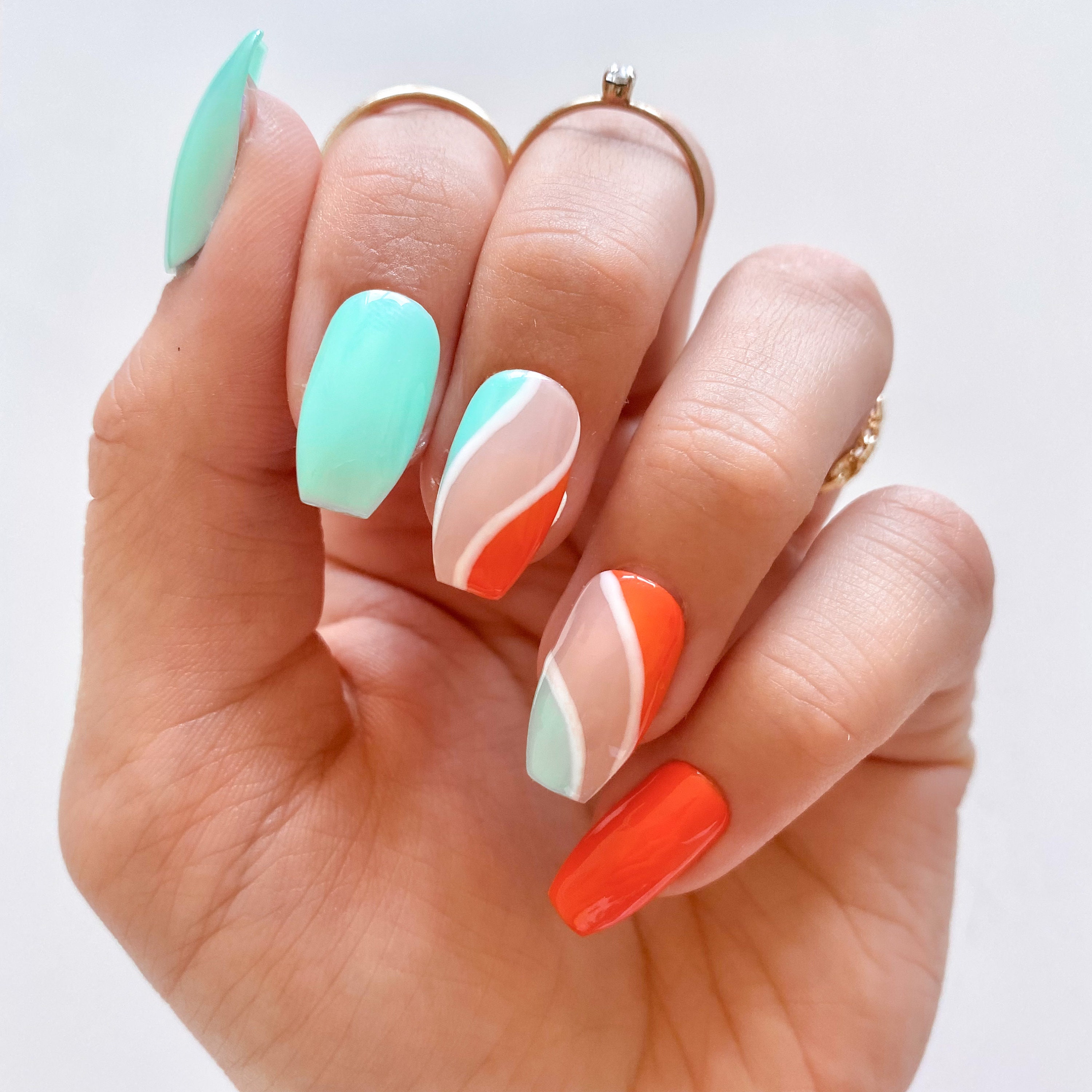 orange and turquoise nail designs