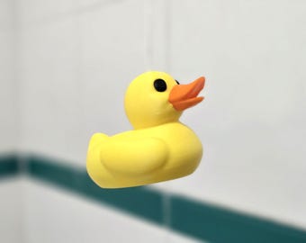 Poignée pour interrupteur d'éclairage de salle de bain inspirée du canard en caoutchouc