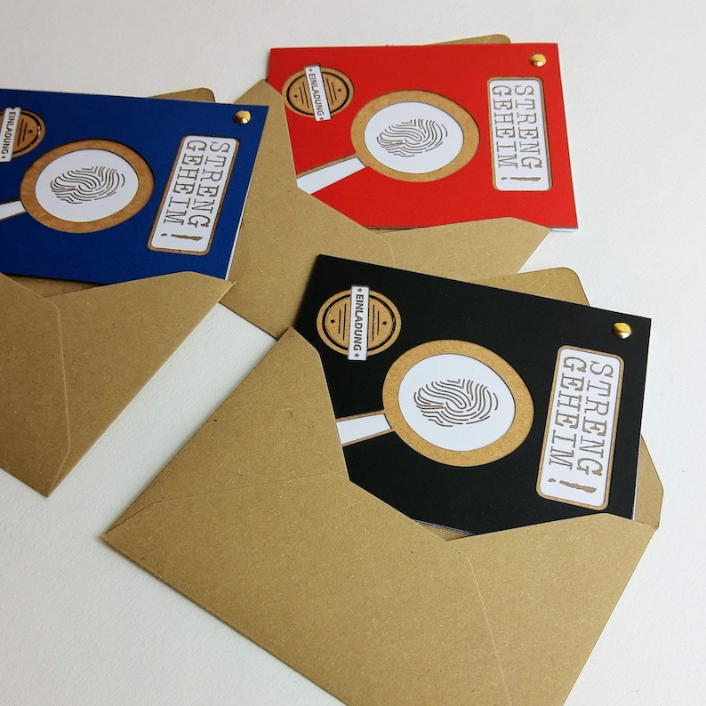 May include: Three invitations with a fingerprint design and the text "streng geheim!" which translates to "strictly confidential!" in English. The invitations are in blue, red, and black and are in brown envelopes.