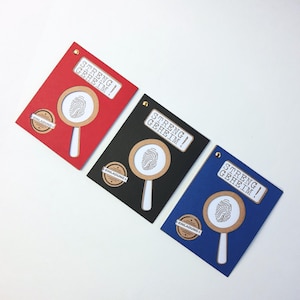 May include: Three invitations with a magnifying glass and fingerprint design. The invitations are red, black, and blue. The text on the invitations reads "Streng Geheim!" which translates to "Strictly Secret!" in English.