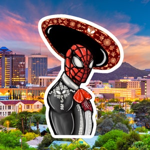 May include: A digital illustration of a superhero wearing a red and black costume and a traditional Mexican sombrero. The superhero is wearing a black suit with silver embroidery and a red sash. The background is a cityscape with a sunset sky.
