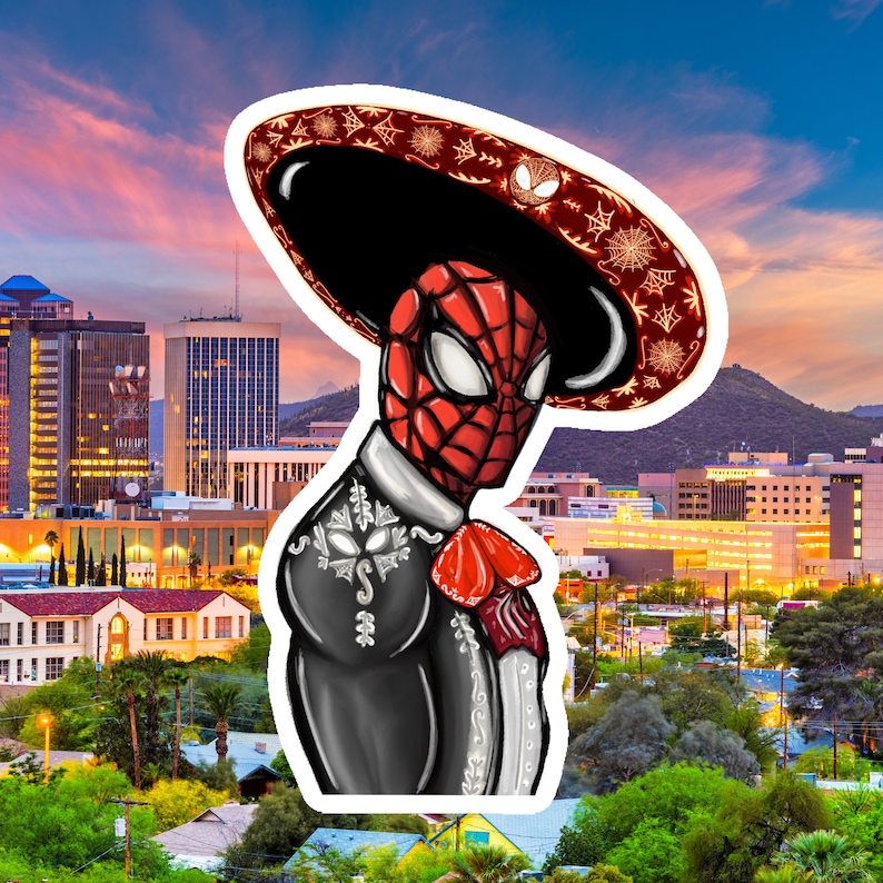 May include: A digital illustration of a superhero wearing a red and black costume and a traditional Mexican sombrero. The superhero is wearing a black suit with silver embroidery and a red sash. The background is a cityscape with a sunset sky.