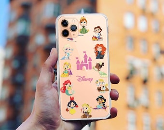 May include: A clear phone case with a pink castle and the word "Disney" printed on it. The case is decorated with various Disney princess characters, including Cinderella, Ariel, Belle, and Snow White.