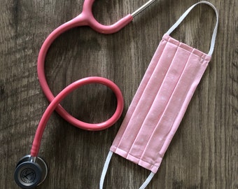 Rosa Gesichtsmaske mit Sternen