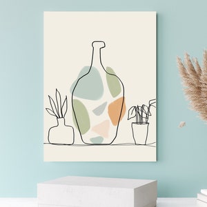 May include: Abstract art print with a black line drawing of a vase and colourful shapes in green, blue, and orange. Two additional line drawings of plants in pots are also included. The background is a light beige colour.