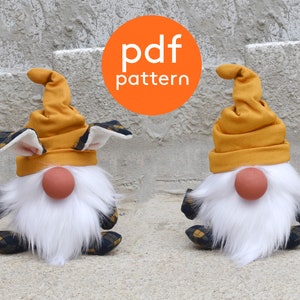May include: Two plush gnomes with white beards and yellow hats. The gnome on the left has bunny ears and a plaid pattern on its clothes. The gnome on the right has a solid yellow hat and plaid pattern on its clothes.  The gnomes are sitting on a gray background.  pdf pattern
