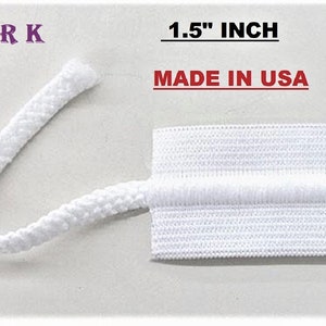 May include: White elastic trim with a 1.5 inch width. The trim is made in the USA. FRK is printed on the image.