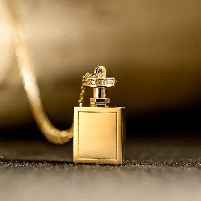 MINIATURE PERFUME HOLDER CHARM IN TRIOMPHE CANVAS AND CALFSKIN