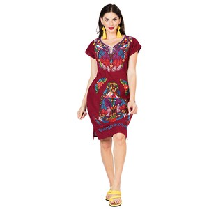 May include: A maroon short-sleeved dress with colorful embroidery featuring a floral design. The dress has a v-neck and a loose fit.