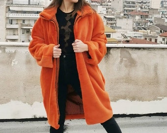 fluffy orange jacket