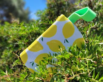 Pochette da polso in tela con stampa limoni e manico verde, astuccio cosmetico con limoni