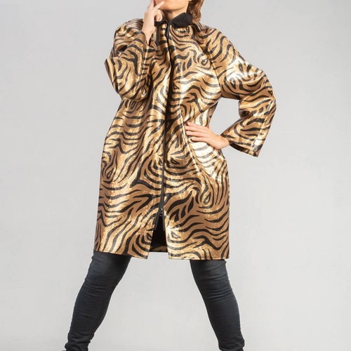 Gold animal print synthetic leather coat Gold zebra print synthetic leather parka raincoat Synthetic online leather gold coat Gold winter outerwear