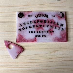 Bloody Ouija board and planchette