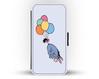 May include: A blue donkey with a pink bow is flying with a bunch of colorful balloons. The balloons are pink, yellow, green, orange, and light blue. The donkey is looking down at the viewer. The background is a light blue color.