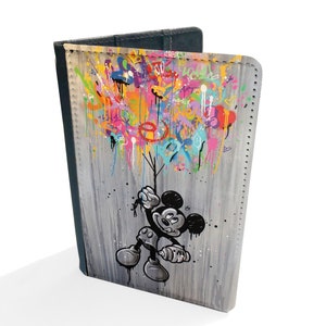 May include: A black and white illustration of Mickey Mouse holding a spray can, with colourful graffiti in the background. The illustration is on a grey and white canvas.