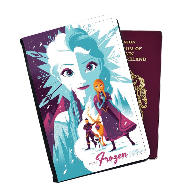 May include: A passport holder featuring a colorful illustration of Elsa and Anna from the Disney movie Frozen. The image includes a castle, snowflakes, and the text "Frozen".