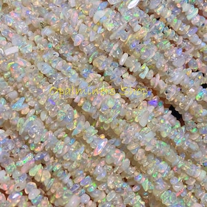 May include: White ceramic mug with a black handle, featuring the text "But First, Coffee" in a handwritten font. The mug is likely to hold between 325-440 ml, ideal for tea or coffee.