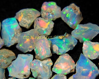 Fine Quality Raw Opal Welo Opal Rough Stone Ethiopian Opal Rough Amazing MultiColor Rough Direct From Mines At Wholesale Price 100% Natural Fine Quality Raw Opal Welo Opal Rough Stone Ethiopian Opal Rough Amazing MultiColor Rough Direct From Mines At Wholesale Price 100% Natural