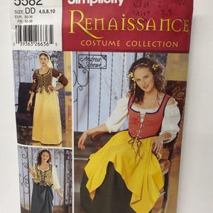 May include: Simplicity 5582 Renaissance Costume Collection sewing pattern envelope for sizes DD 4, 6, 8, 10. The cover features illustrations of three different outfits consisting of bodices, skirts, and blouses with lace-up details.