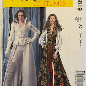May include: McCall's Costumes M6819 sewing pattern envelope featuring two costume designs. Design B shows a white jacket with a high collar, long sleeves, and matching pants. Design A shows a floral print long vest, white blouse, and brown pants.