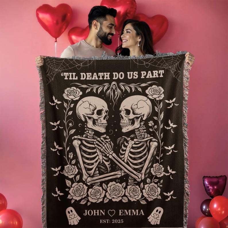 May include: A black woven throw blanket with the phrase "'TIL DEATH DO US PART" and a design featuring two skeletons holding hands, surrounded by roses and bats. The blanket includes the names "JOHN ♡ EMMA" and the year "EST: 2025".