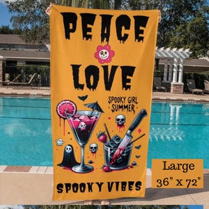 May include: Orange beach towel with the words "PEACE LOVE" in black, along with "Spooky Girl Summer" and "Spooky Vibes." The towel features spooky cocktail and skull graphics. It measures 36" x 72".
